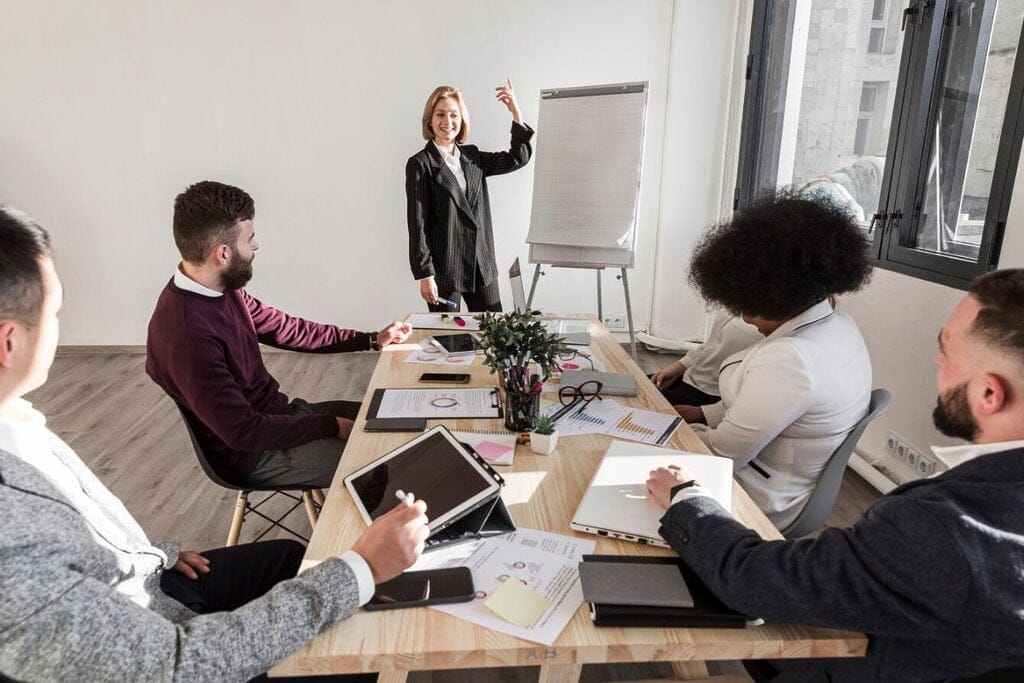 Professional presentation with a flipchart in a modern office.