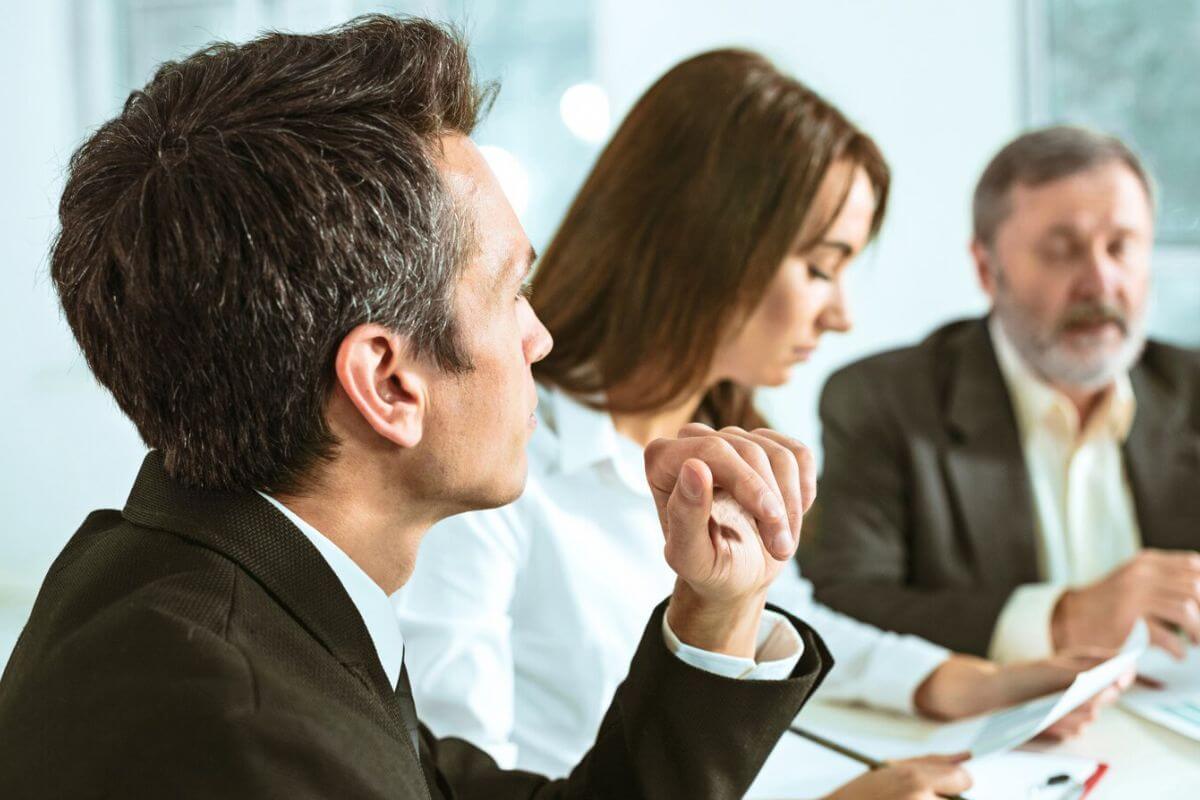 Business professionals analyzing important documents.