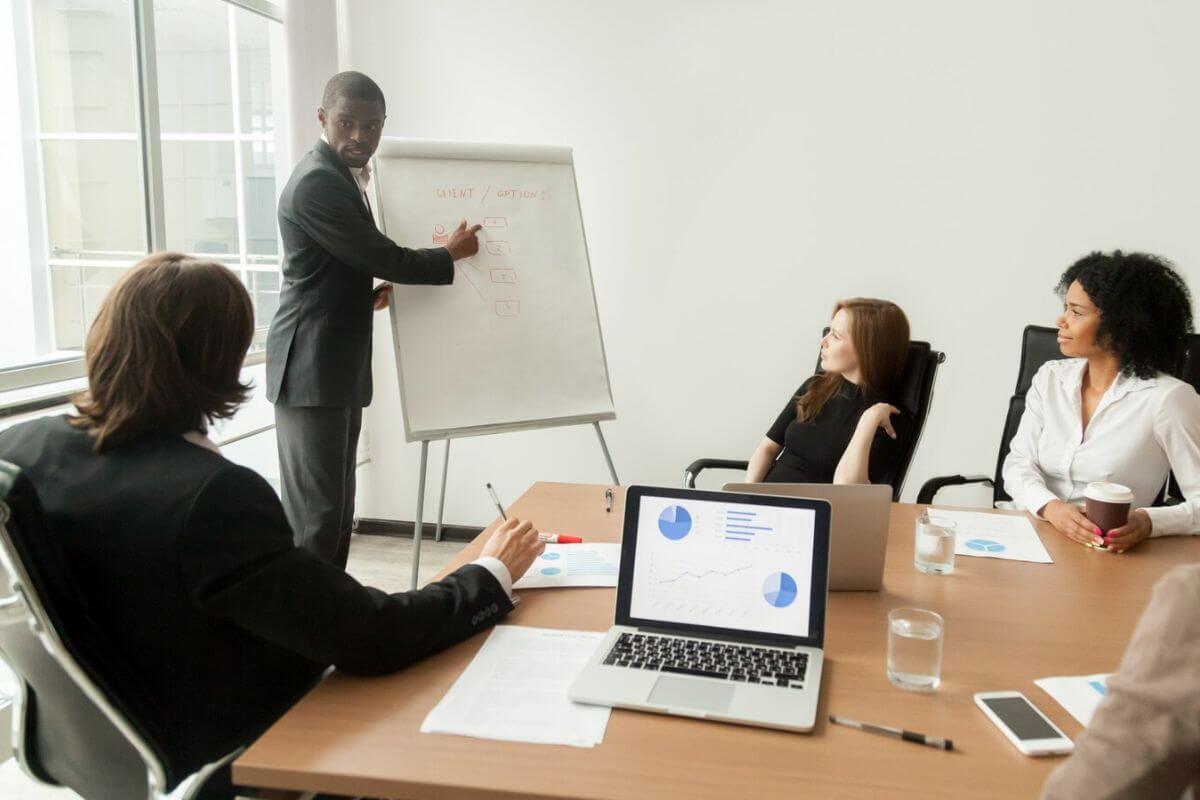 Business team discussing strategies in a meeting room.