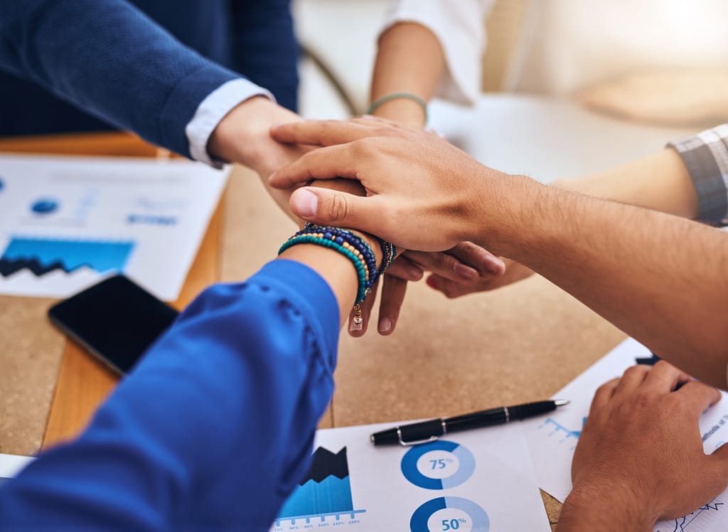 A visual representation of trust-building through active listening, showing a coach engaged with team members.