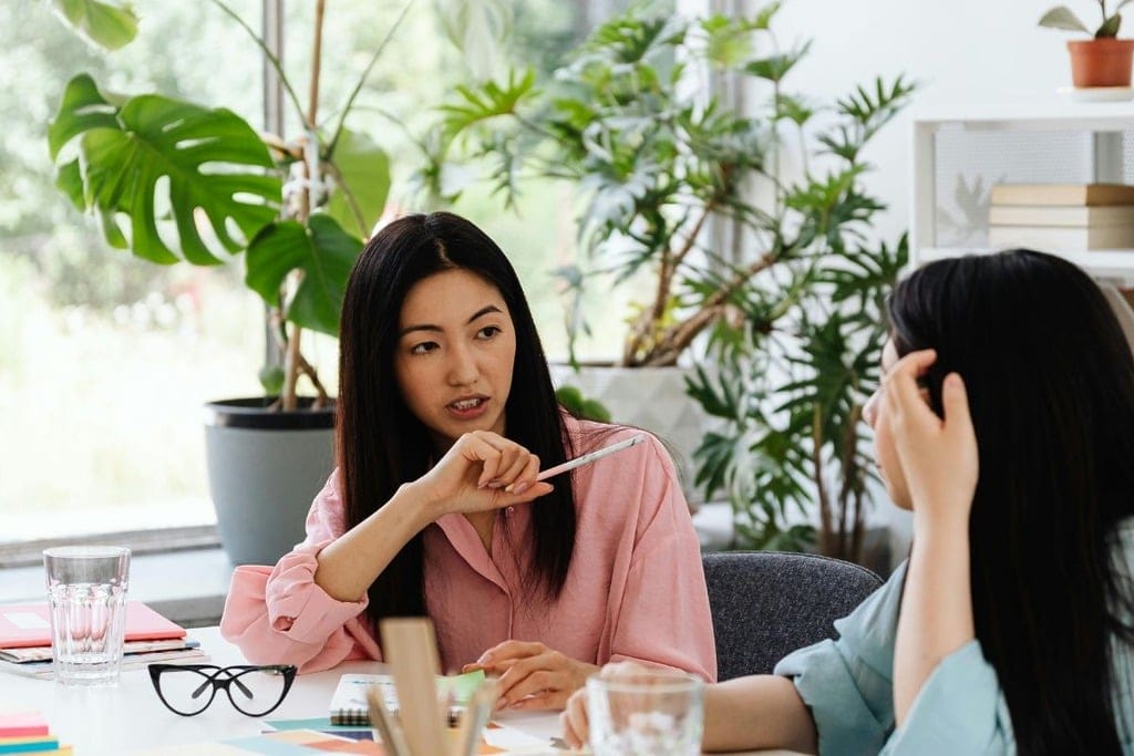 Colleagues collaborating during a business meeting.
