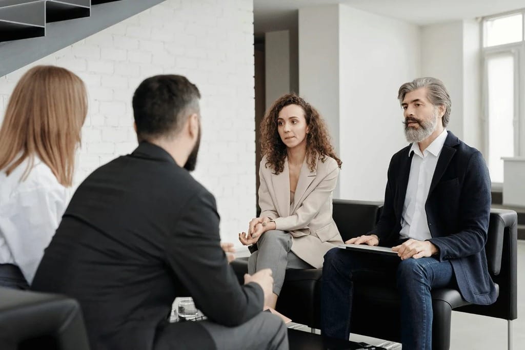 Team of professionals collaborating in an open office space.
