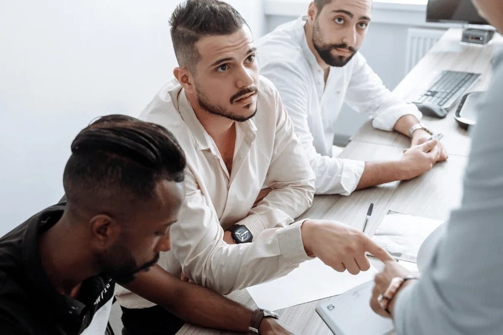 Business team collaborating during a boardroom meeting.
